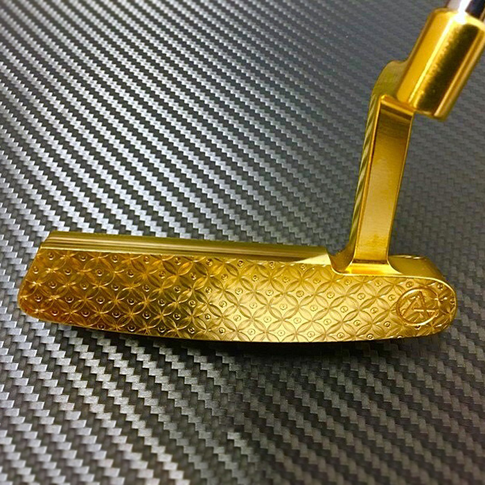 Solid gold putter